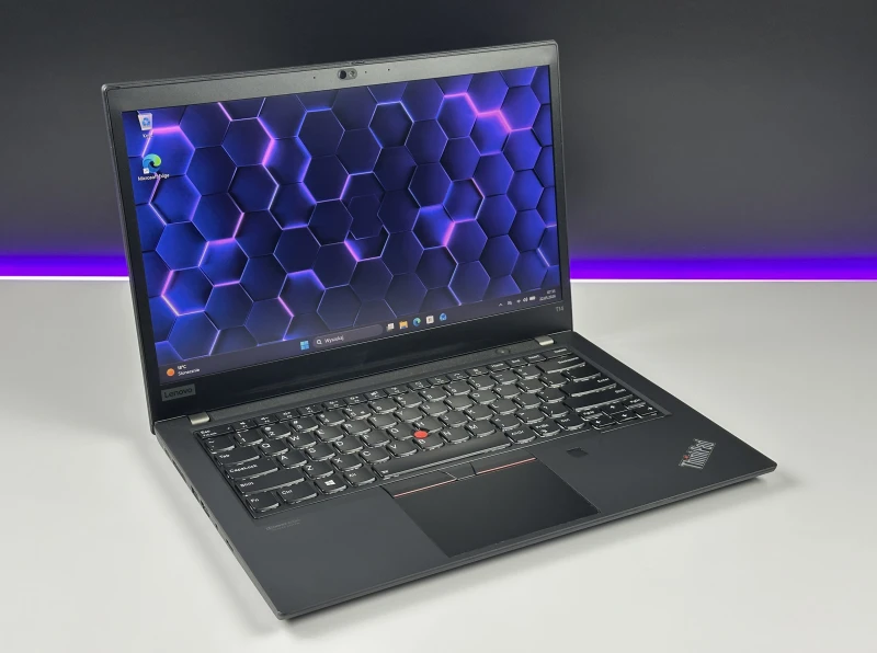 Lenovo ThinkPad T14 Gen 1 - i7-10610U, ekran 14" FHD. Biznesowy laptop z klawiaturą US (QWERTY PL), idealny do pracy biurowej i mobilnej.
