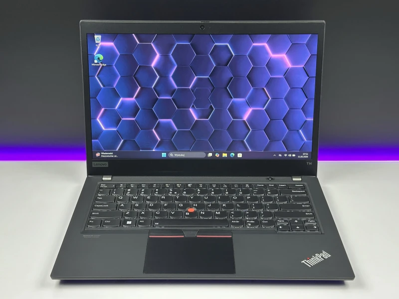 Lenovo ThinkPad T14 Gen 1 z procesorem i5-10310U, ekranem 14" i Intel UHD Graphics. Laptop biznesowy z klawiaturą US i złączem Thunderbolt 3.