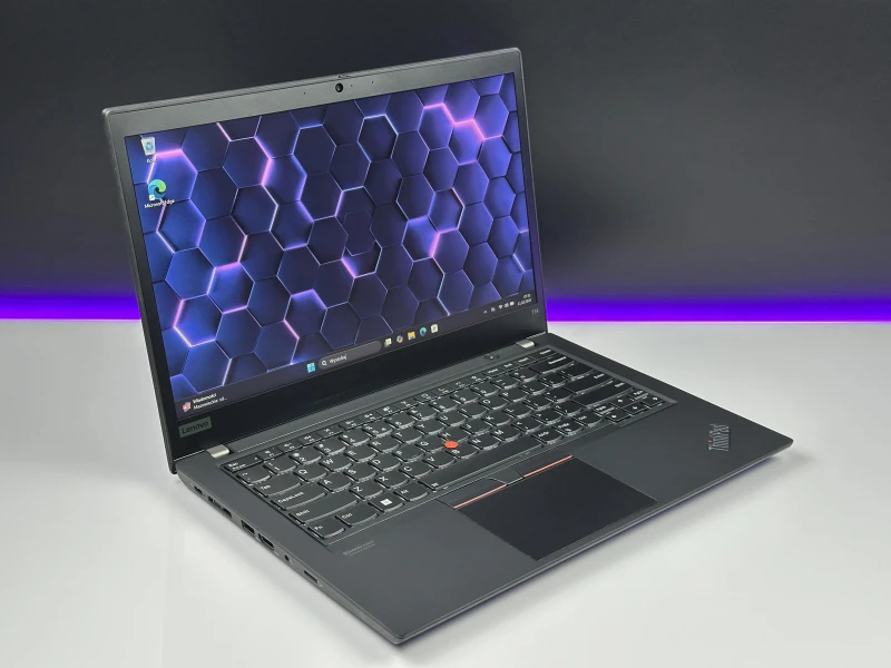 Lenovo ThinkPad T14 Gen 1 z procesorem i5-10310U, ekranem 14" i Intel UHD Graphics. Laptop biznesowy z klawiaturą US i złączem Thunderbolt 3.