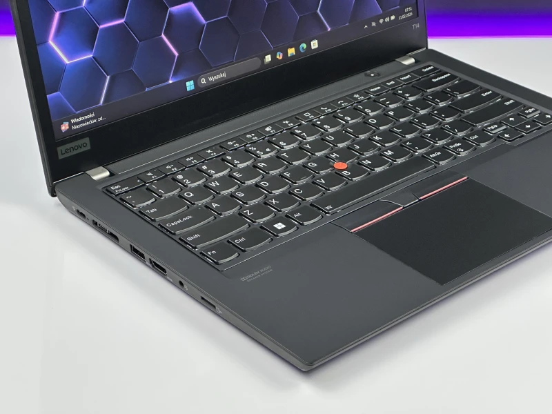 Lenovo ThinkPad T14 Gen 1 z procesorem i5-10310U, ekranem 14" i Intel UHD Graphics. Laptop biznesowy z klawiaturą US i złączem Thunderbolt 3.