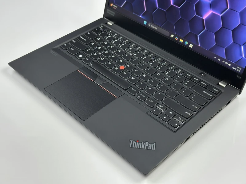 Lenovo ThinkPad T14 Gen 1 z procesorem i5-10310U, ekranem 14" i Intel UHD Graphics. Laptop biznesowy z klawiaturą US i złączem Thunderbolt 3.