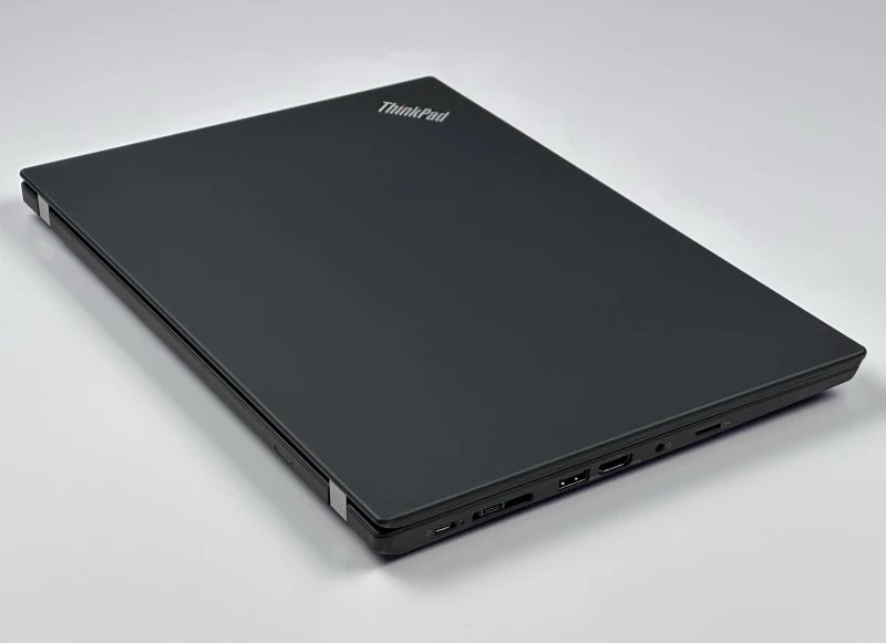 Lenovo ThinkPad T14 Gen 1 z procesorem i5-10310U, ekranem 14" i Intel UHD Graphics. Laptop biznesowy z klawiaturą US i złączem Thunderbolt 3.