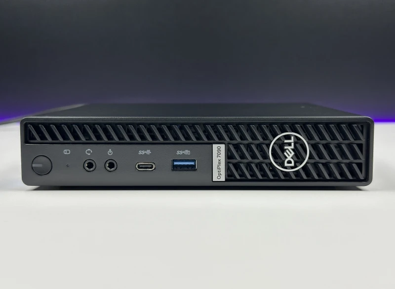 Dell OptiPlex 7090 Micro z i5-11500T, pamięcią DDR4 i Intel UHD 750. Komputer z zewnętrzną anteną Wi-Fi i łatwym dostępem do podzespołów.