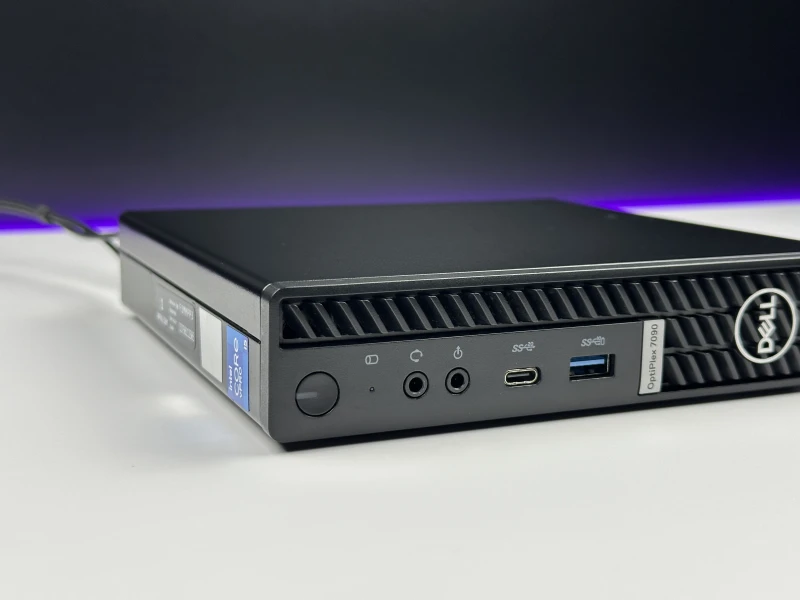 Dell OptiPlex 7090 Micro z i5-11500T, pamięcią DDR4 i Intel UHD 750. Komputer z zewnętrzną anteną Wi-Fi i łatwym dostępem do podzespołów.