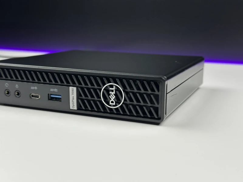 Dell OptiPlex 7090 Micro z i5-11500T, pamięcią DDR4 i Intel UHD 750. Komputer z zewnętrzną anteną Wi-Fi i łatwym dostępem do podzespołów.