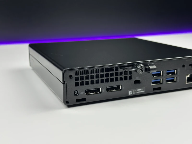 Dell OptiPlex 7090 Micro z i5-11500T, pamięcią DDR4 i Intel UHD 750. Komputer z zewnętrzną anteną Wi-Fi i łatwym dostępem do podzespołów.