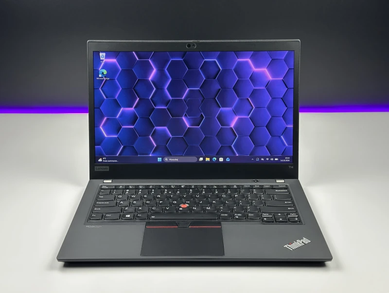 Lenovo ThinkPad T14 Gen 1 - i7-10610U, ekran 14" FHD. Biznesowy laptop z klawiaturą US (QWERTY PL), idealny do pracy biurowej i mobilnej.