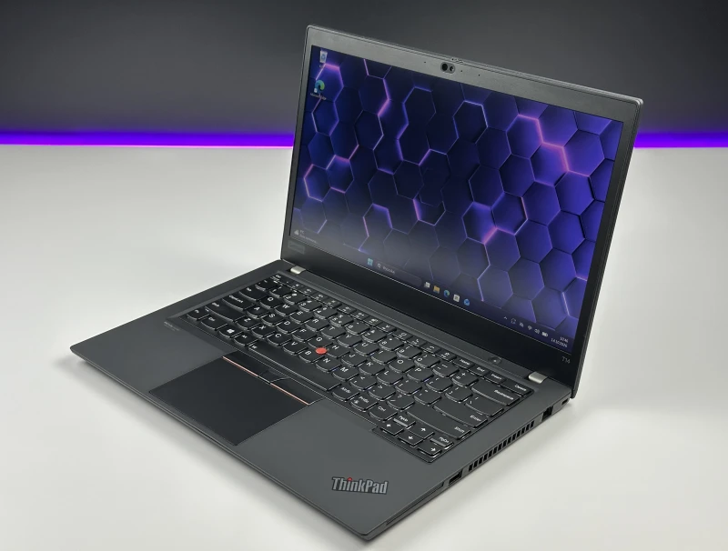 Lenovo ThinkPad T14 Gen 1 - i7-10610U, ekran 14" FHD. Biznesowy laptop z klawiaturą US (QWERTY PL), idealny do pracy biurowej i mobilnej.